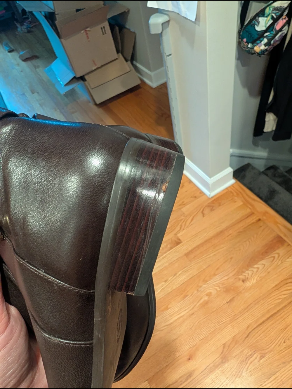 Black Leather Knee-High Boots with Gold Accent